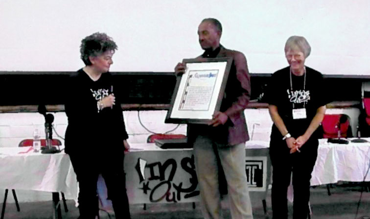 Kay Harris receiving award